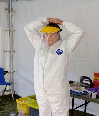 Photo of Professor Tracy Rogers in personal protective gear